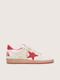 White leather with a red star and heel tab