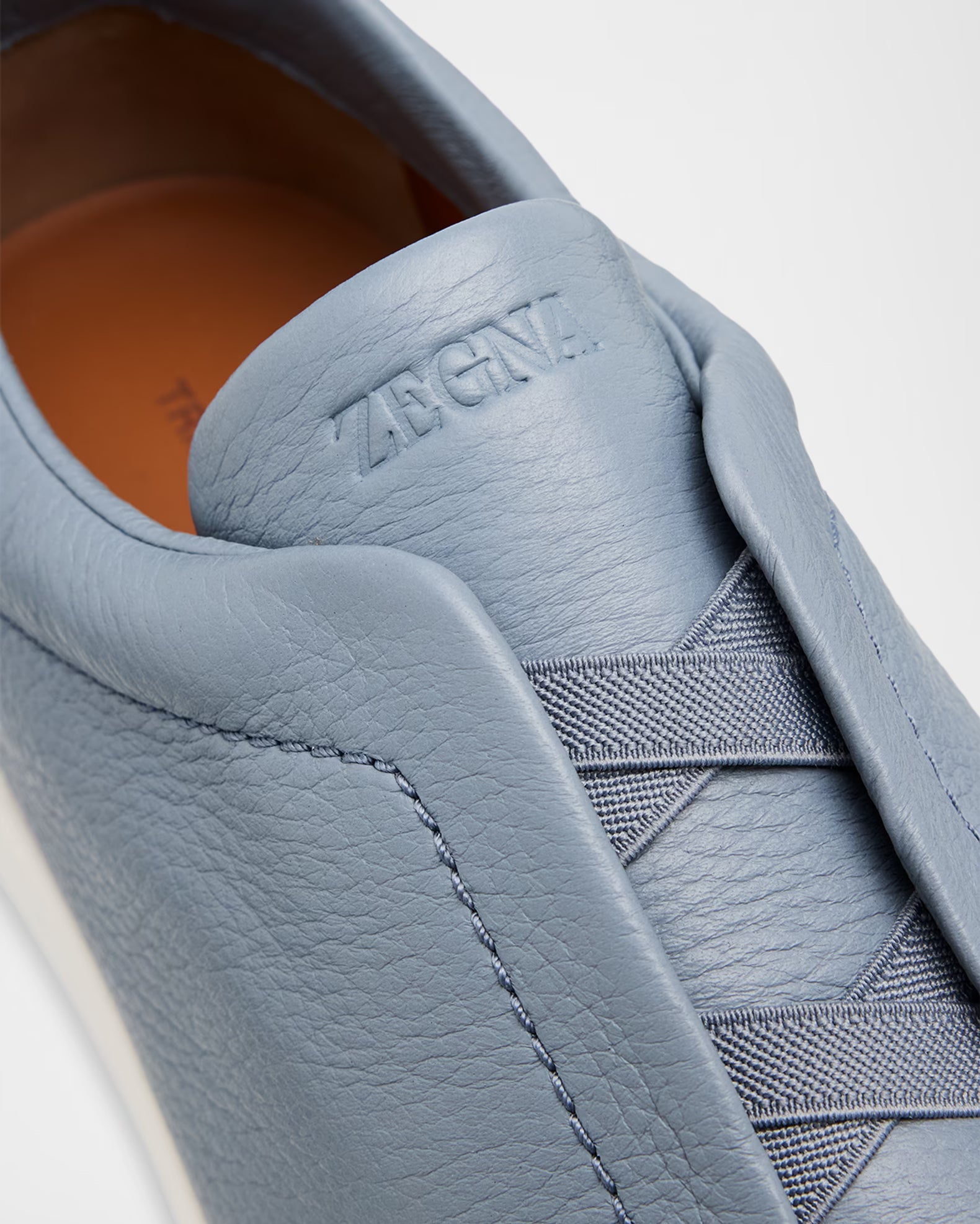 Triple Stitch Deerskin Leather Slip-On Sneakers